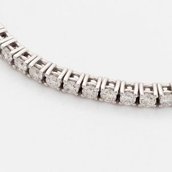 Brilliant-cut diamond tennis bracelet, with report HRD.