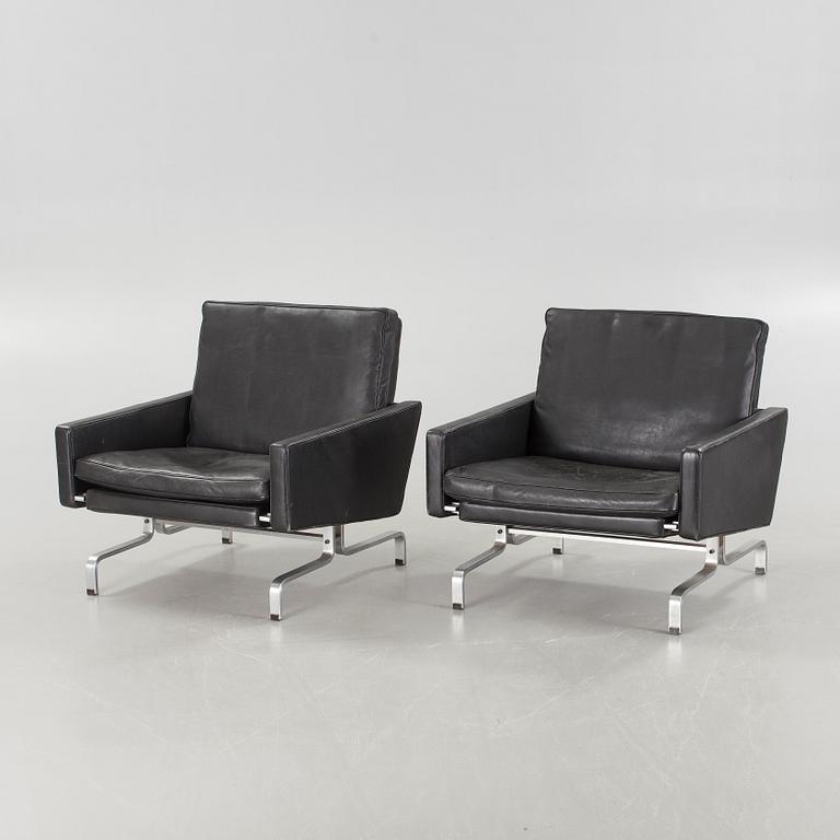 A pair of "PK31" chairs, designed by Poul Kjaerholm, one labeled Frtiz Hansen, 1983.