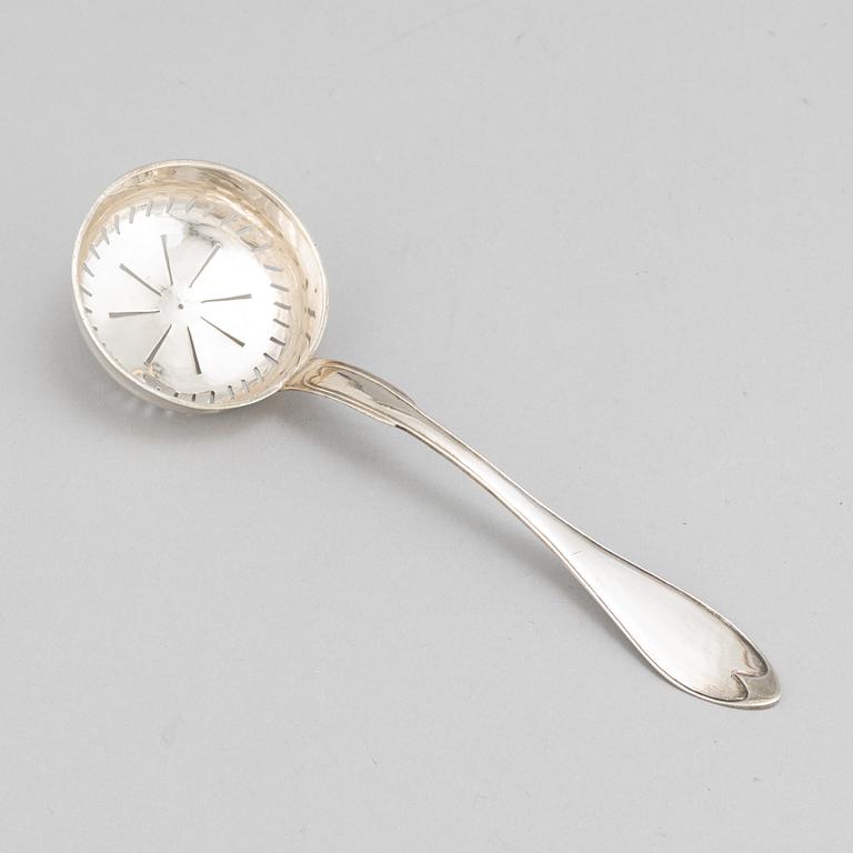 A Swedish 18th / 19th century silver beaker, cup and caster-spoon.