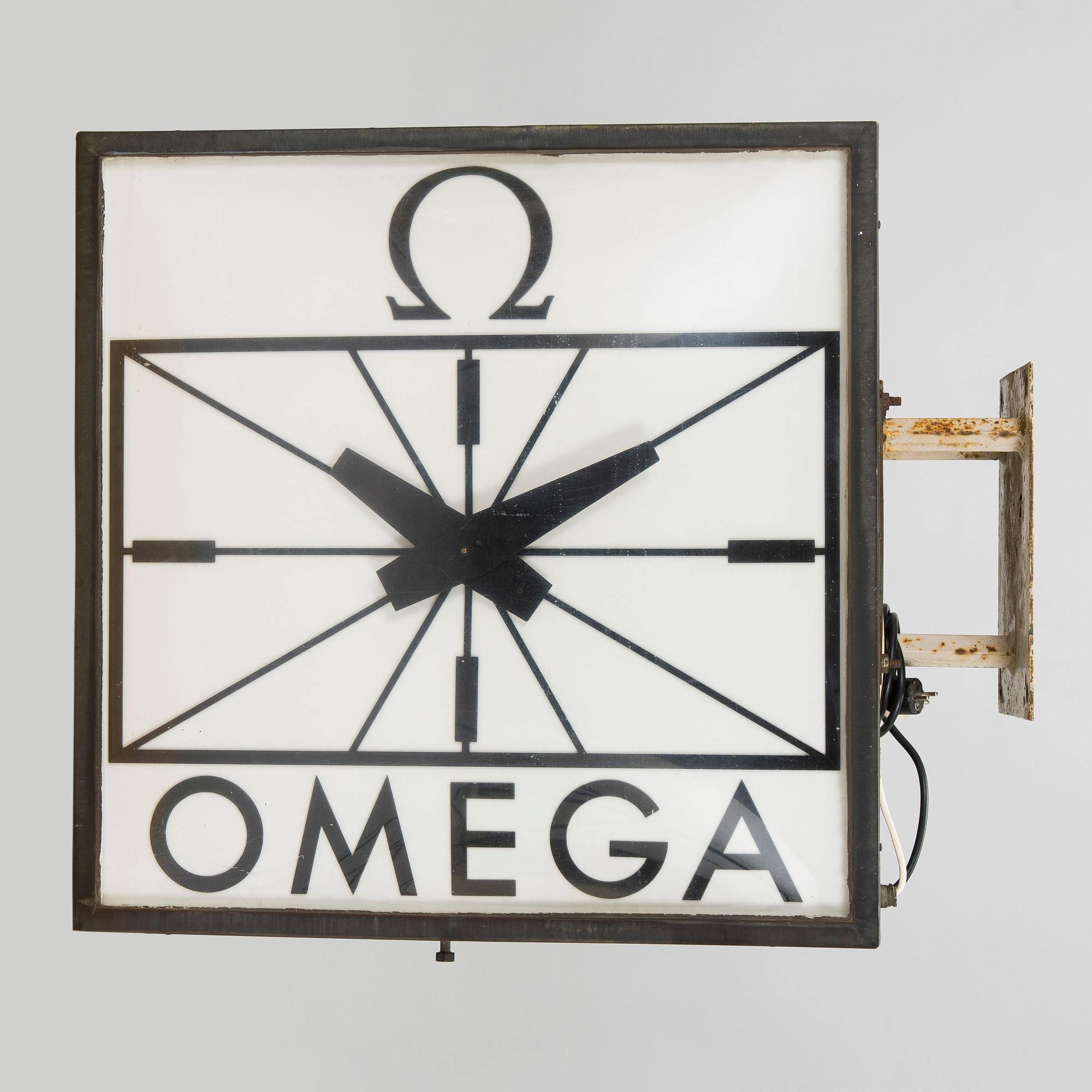 Reklamklocka, Omega, 1900-talets andra hälft.