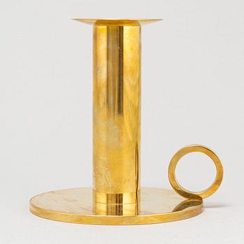 SIGURD PERSSON, a brass candleholder.