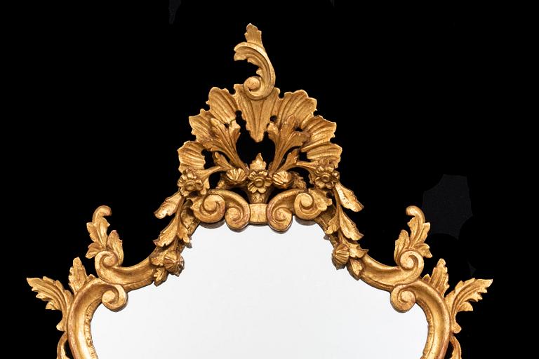 An mid 20th century Louis XV-style mirror from Paoletti, Firenze Italy.