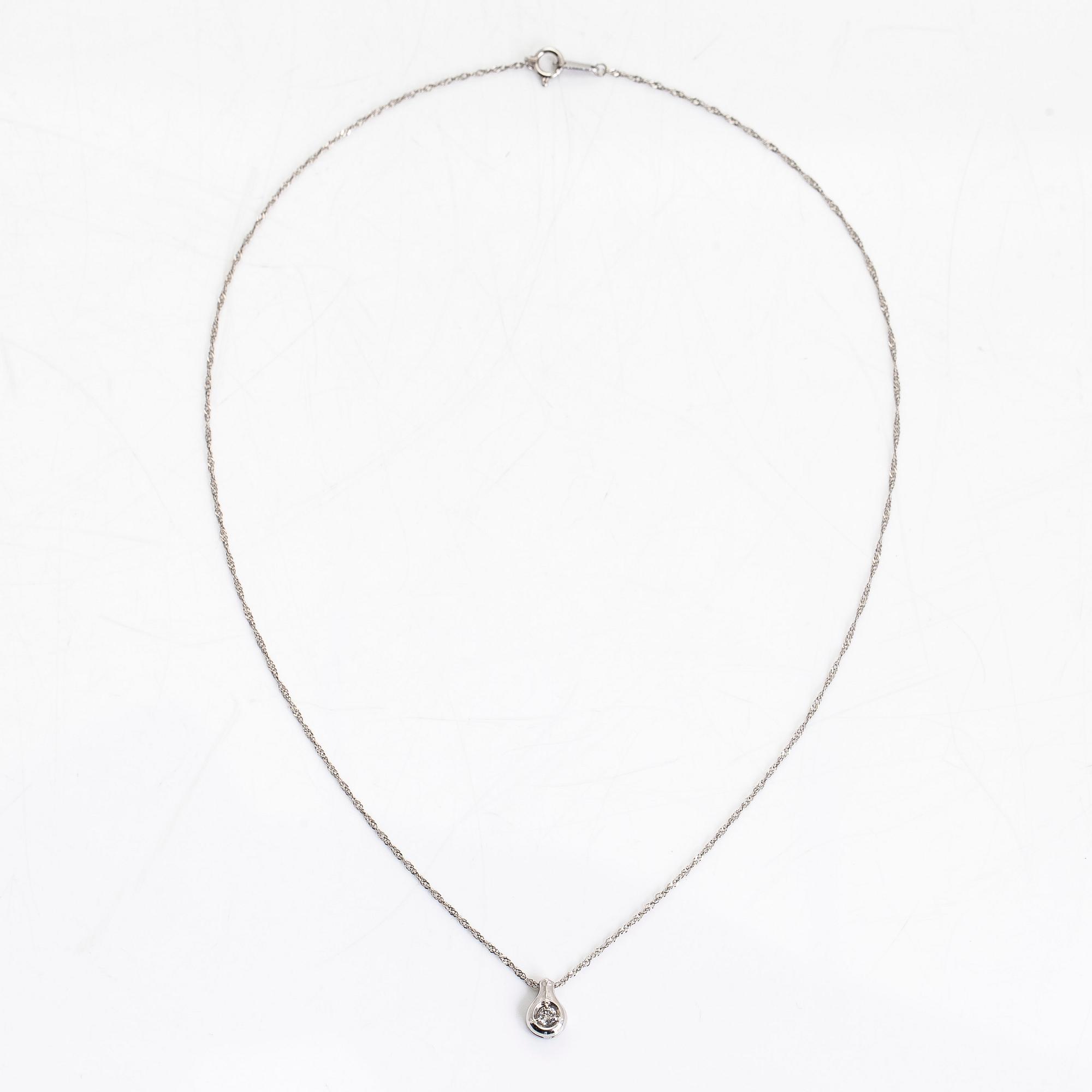 A platinum necklace, with a round brilliant-cut diamond ca. 0.10 ct.