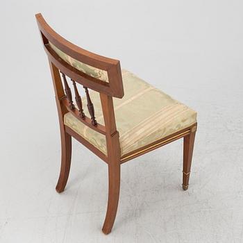 A sofa, two armchairs, four chairs and table, Empire style, 20th century.