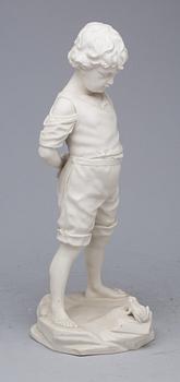 FIGURIN, parian, Gustavsberg, stämpelsignerad 1912.
"Pojken och grodan".