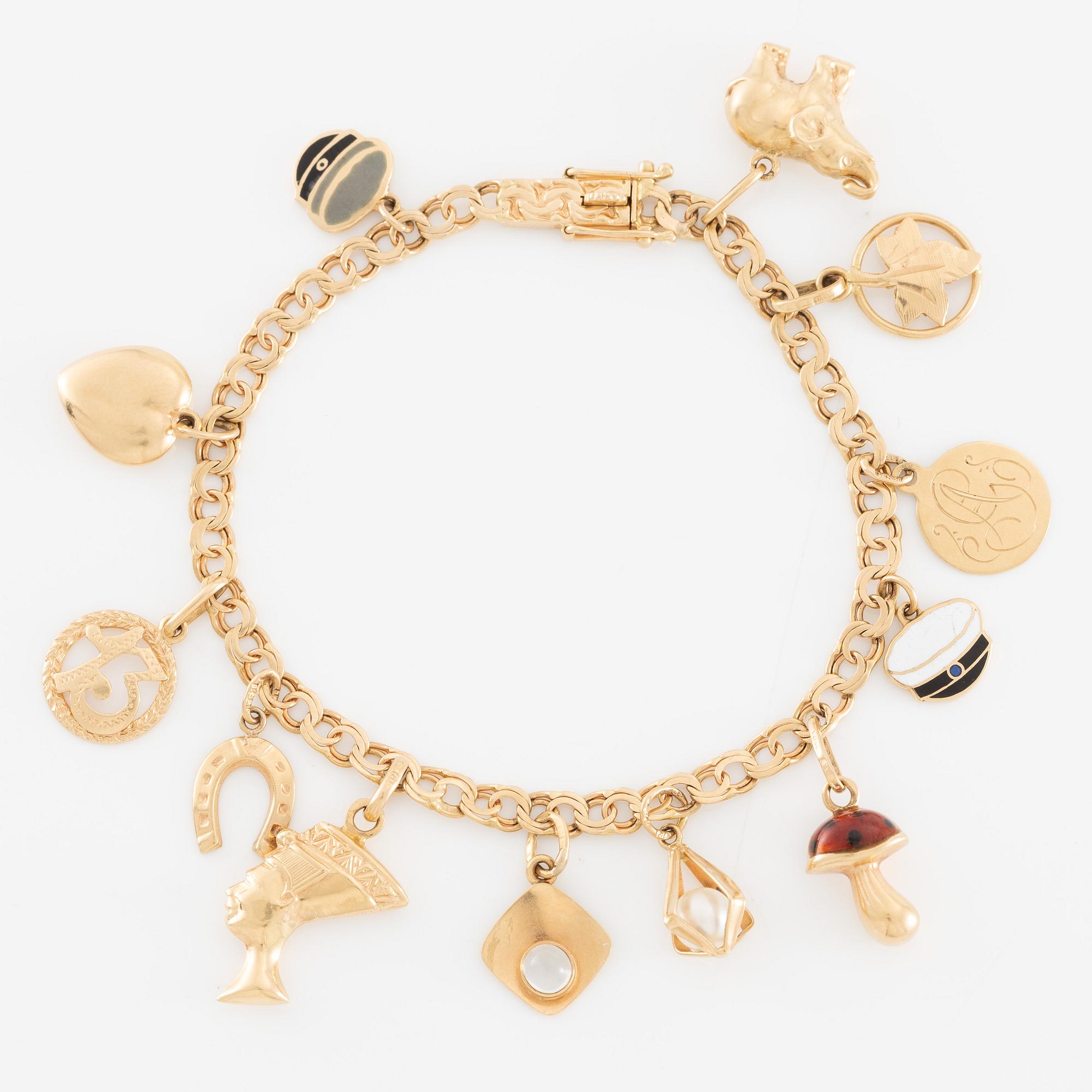 Armband 18K guld med berlocker.