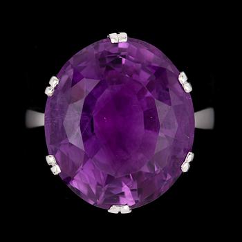 158. An amethyst ring, 1991.