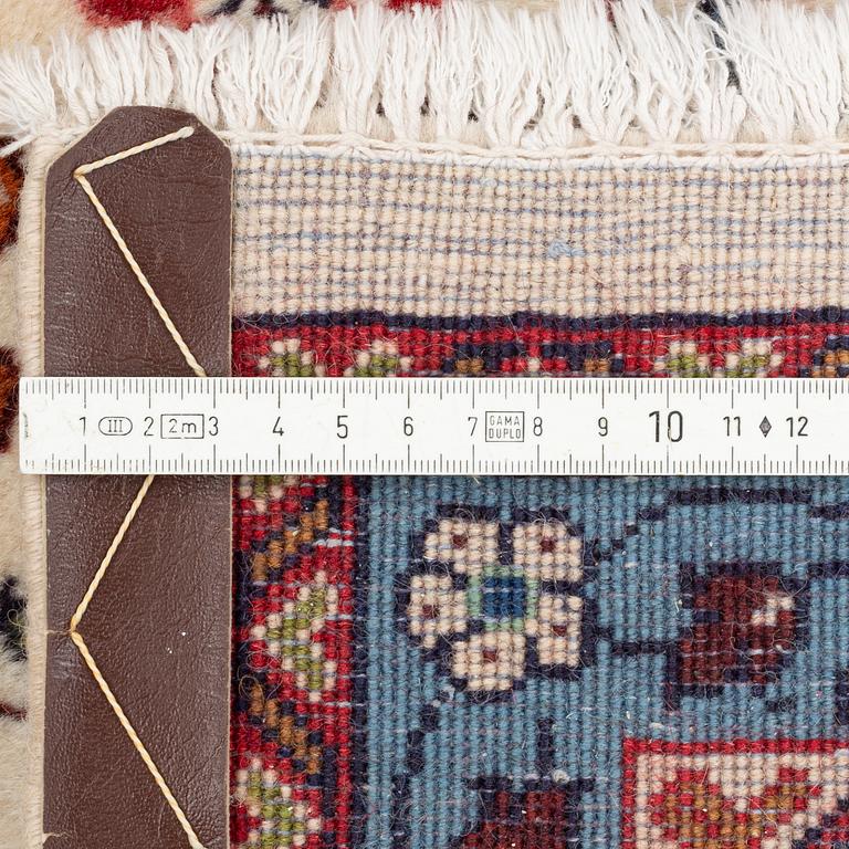 A rug, Kerman, figural, ca 222 x 218 cm.