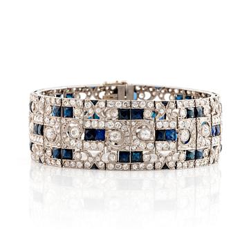 489. A platinum bracelet set with old-cut diamonds and step-cut sapphires.