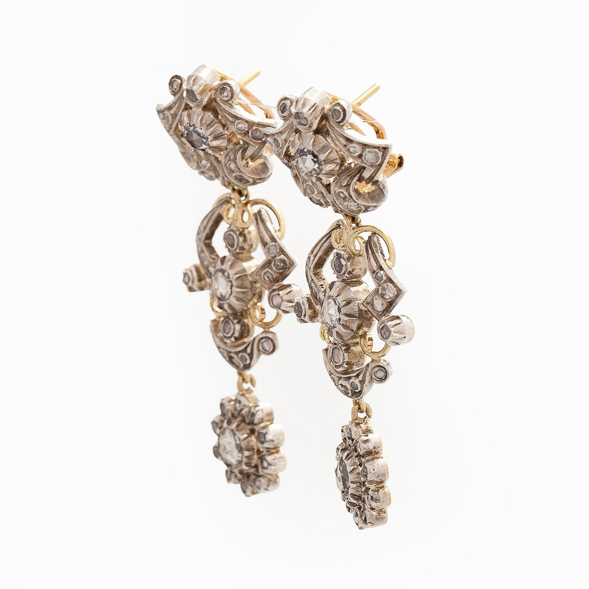 Korvakorut, 18K kultaa ja ruusuhiottuja timantteja.