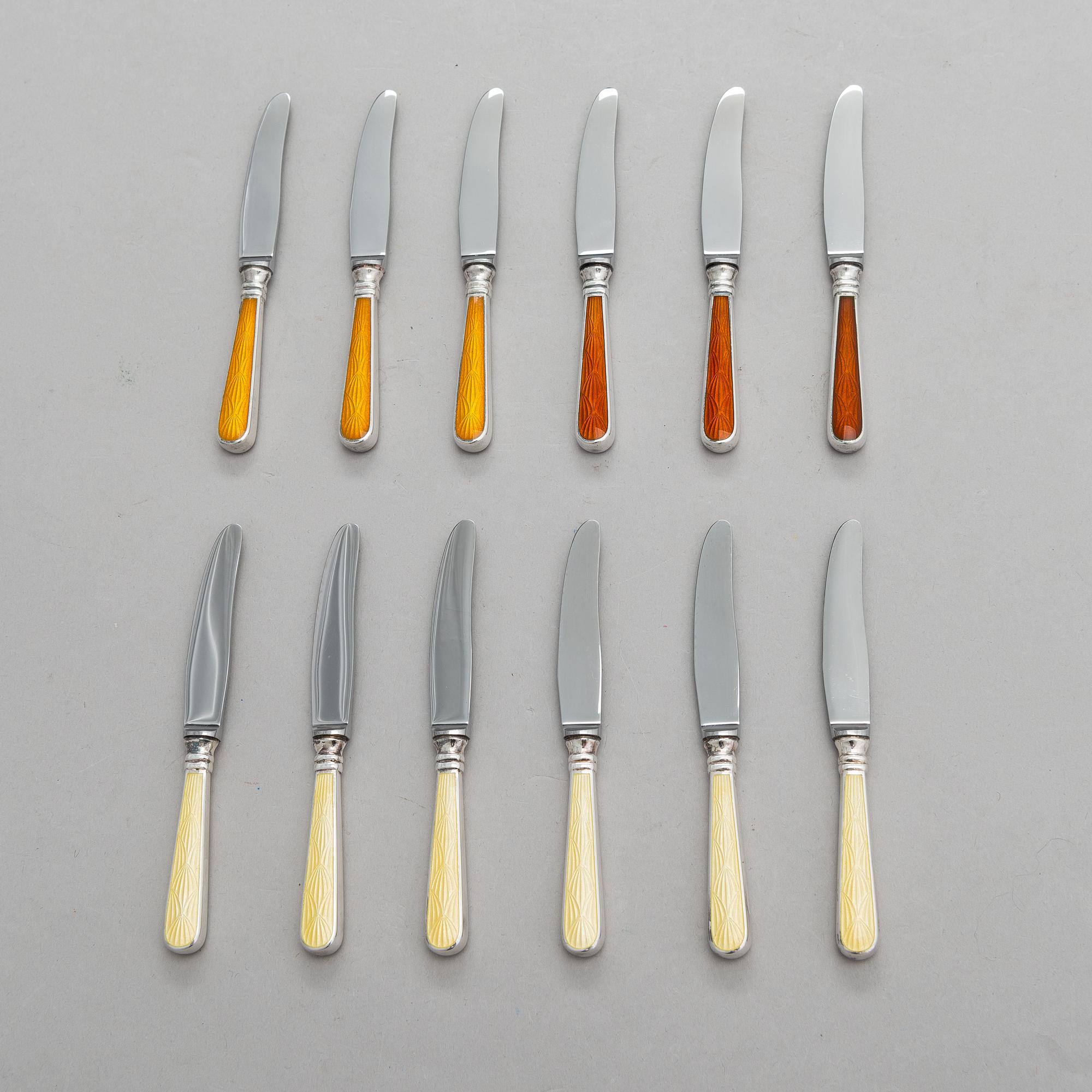 A set of twelve Tillander knives, enamel and silver (.916), Helsinki, Finland 1968. Danish steel blades.