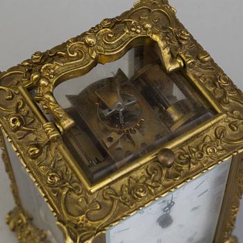 A travelling clock, signed "Potonie Paris", France, second half of the 19th century.