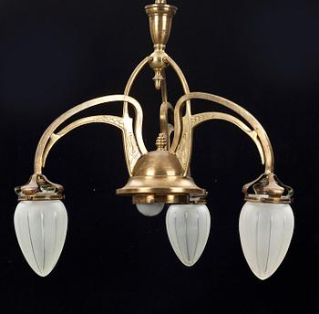TAKLAMPA, jugend. 1900-talets början.