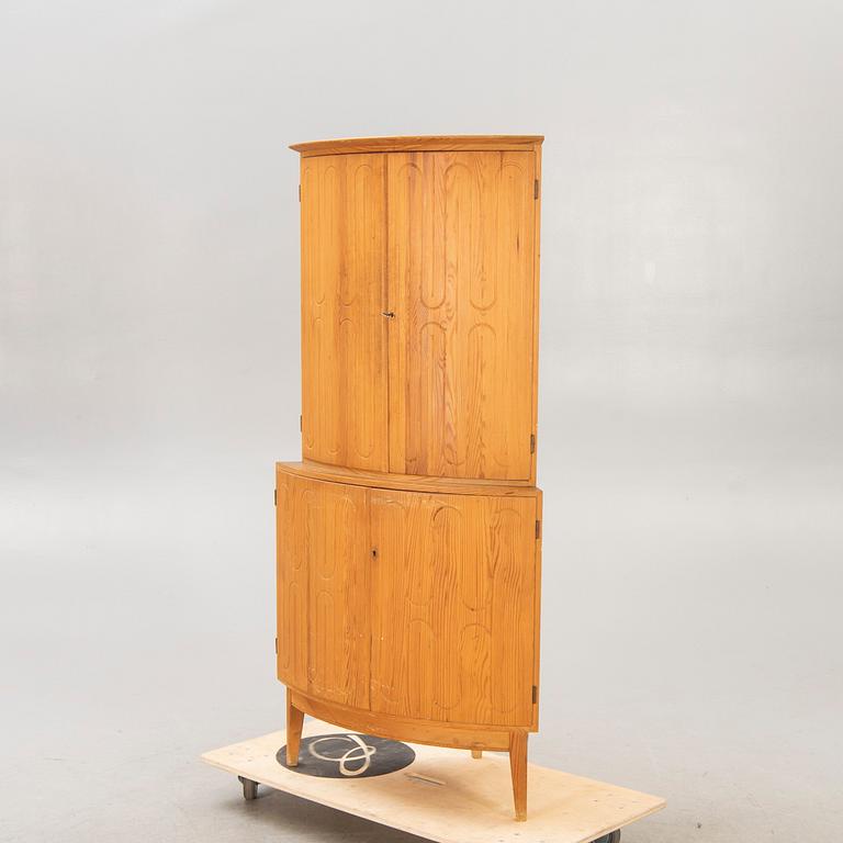 A 1950/60s pine corner cabinet.