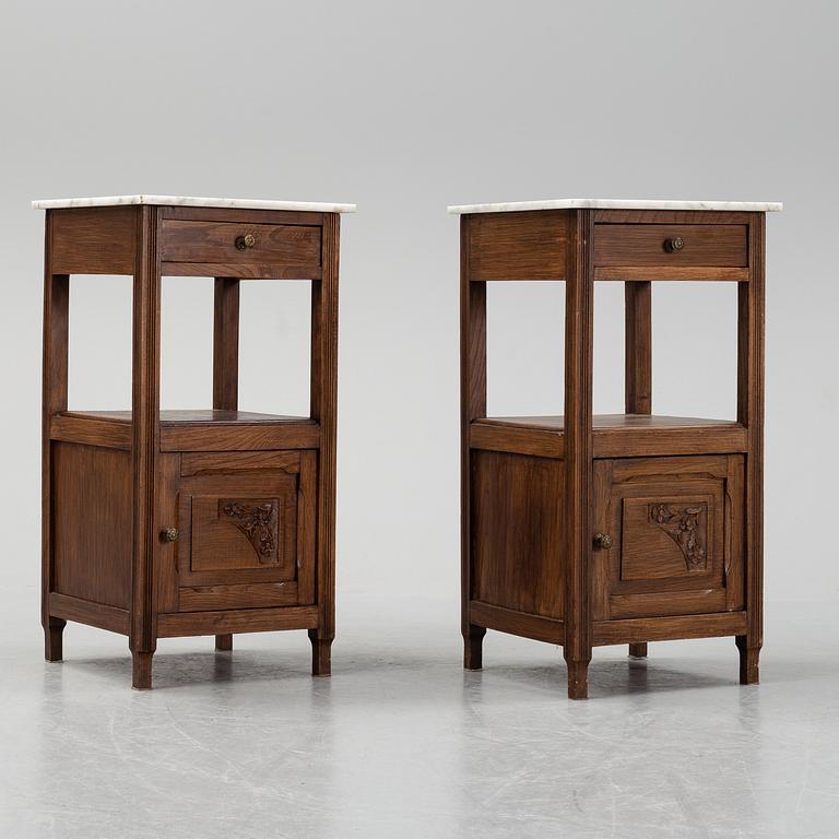 A pair of early 20th Century bedside tables.