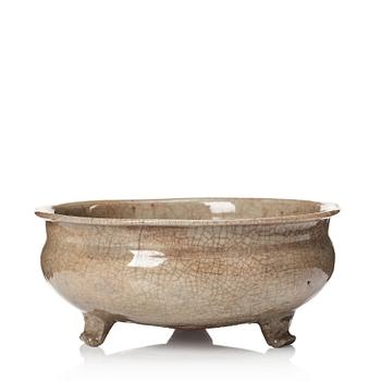 754. A pale celadon glazed tripod censer, Ming dynasty, 17th Century.