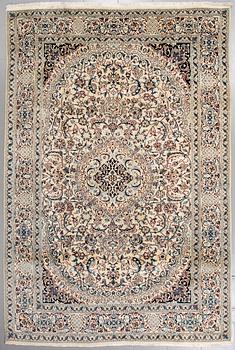 A Nain rug, part silk, 300 x 200 cm.