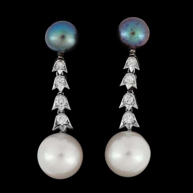 A pair of cultured pearl and diamond app. tot. 0.40 ct earrings.