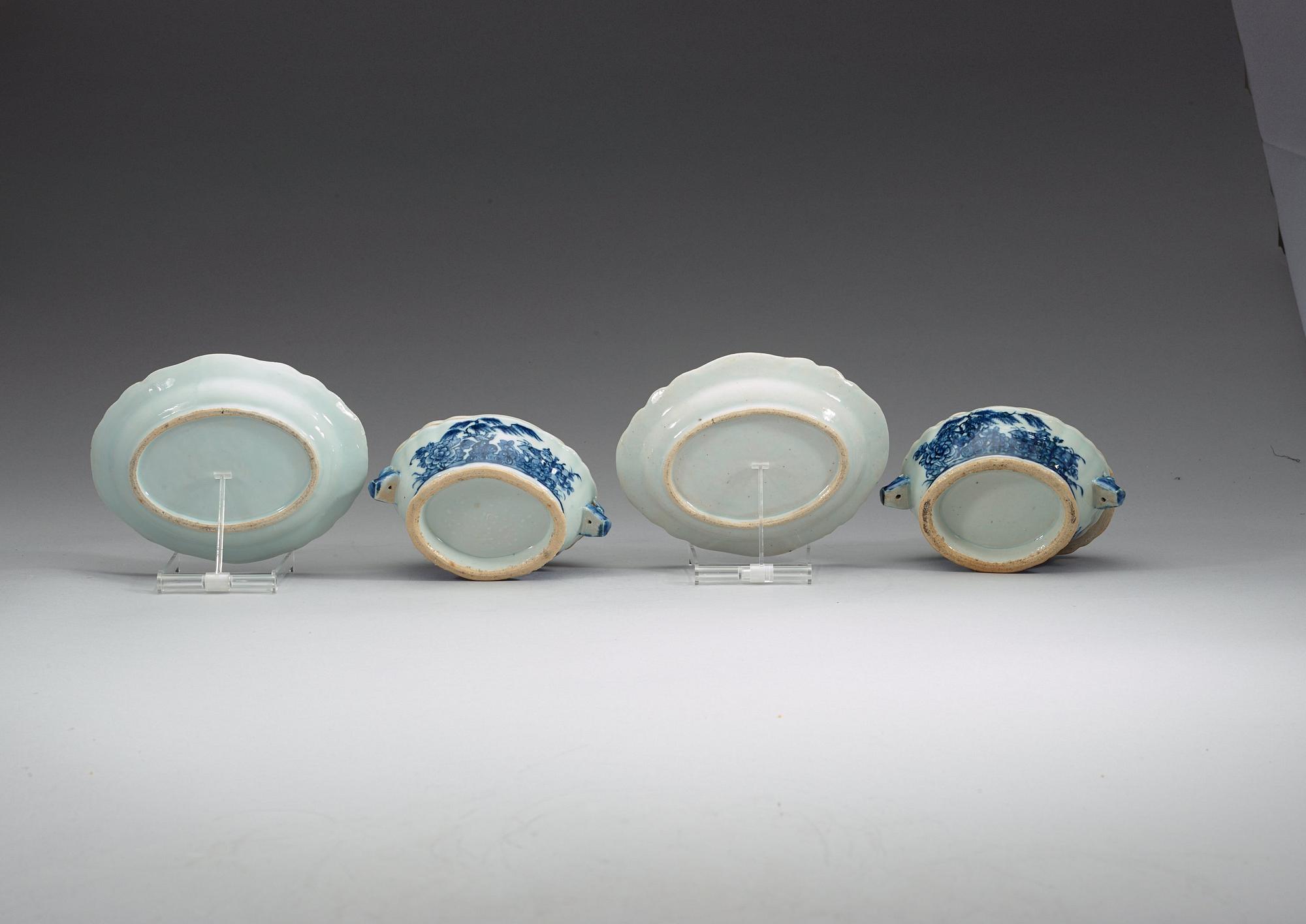A pair of blue and white butter tureens with covers and stands, Qing dynasty, Qianlong (1736-95).