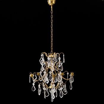 A Rococo style chandelier, mid 20th Century.