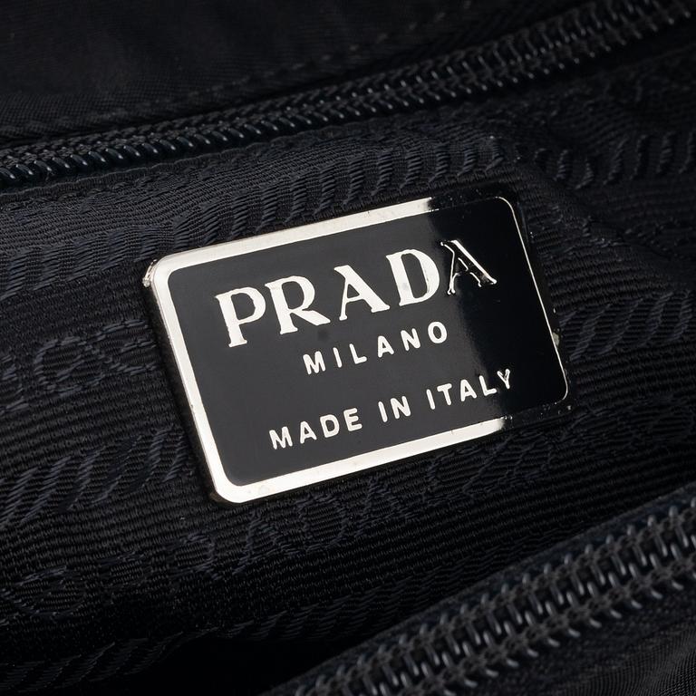 Prada, a black nylon handbag.