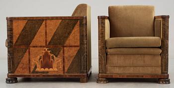A pair of Swedish 1930's stained birch armchairs attributed to Alvar Andersson.