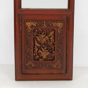 A panel with mirror glass, China, late Qing dynasty.
