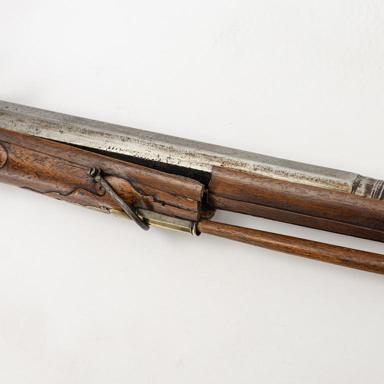 A flintlock gun, 18th century.