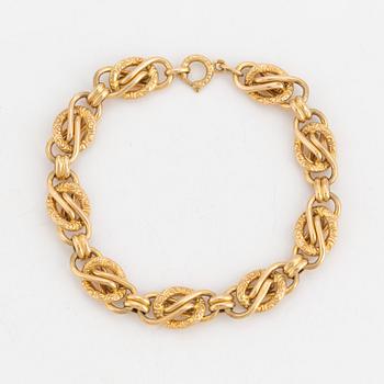 A fancy-link bracelet.