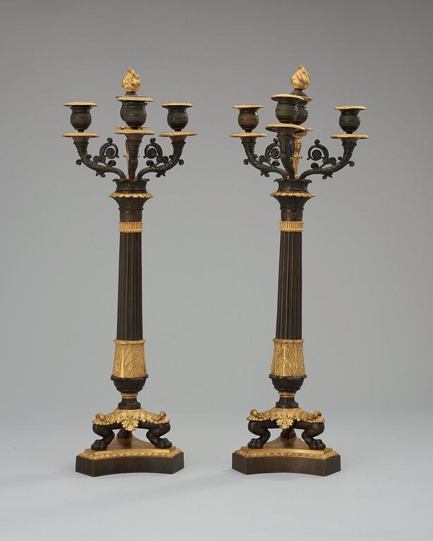 A pair of French Empire 19th century four-light candelabra.