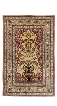360. A semi-antique/old silk Hereke rug, West Anatolia, c. 103 x 66 cm.