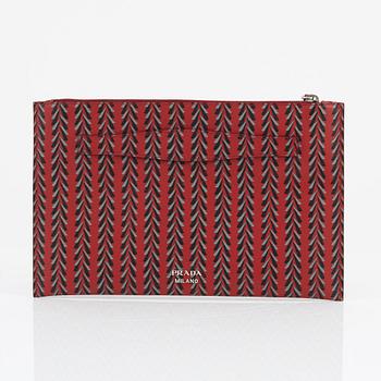 Prada, A patterned saffiano clutch.