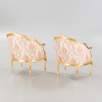 A pair of rococo style bergères, late 19th century.