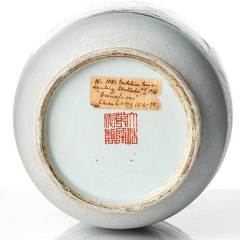 A large famille rose and scrafitto landscape vase, Qing dynasty, with Qianlong seal mark in red.