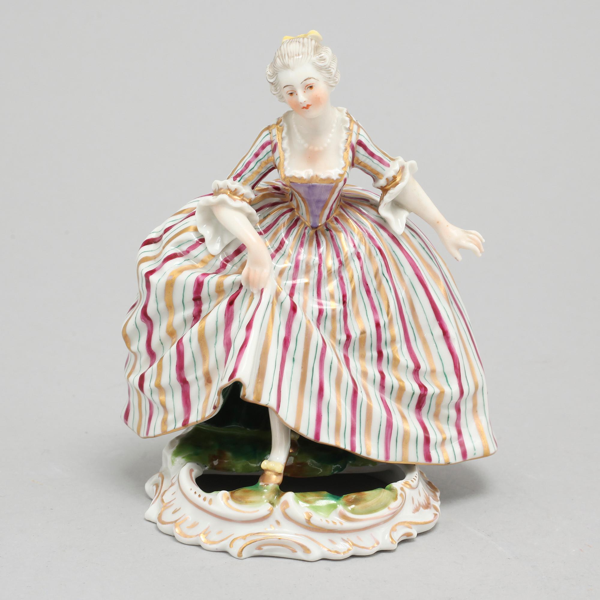 A porcelain figurine with Sevres-like marking, circa turn of the century 1900.