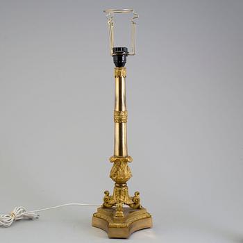 A LATE EMPIRE ORMOLU TABLE LAMP, mid 19th century.