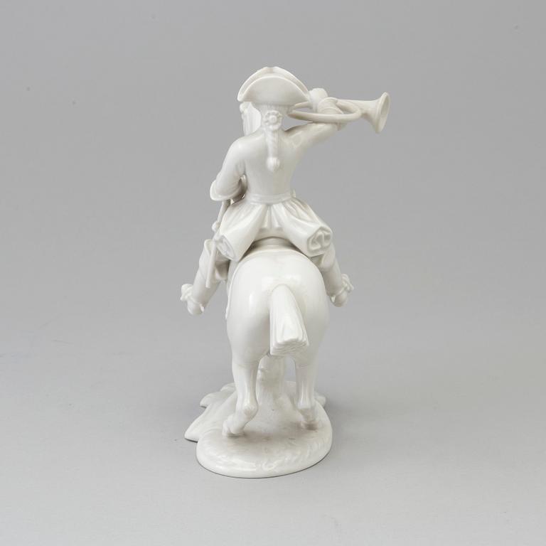 A white glazed Nymphenburg porcelain figure of a huntsman, Germany 20th Century.