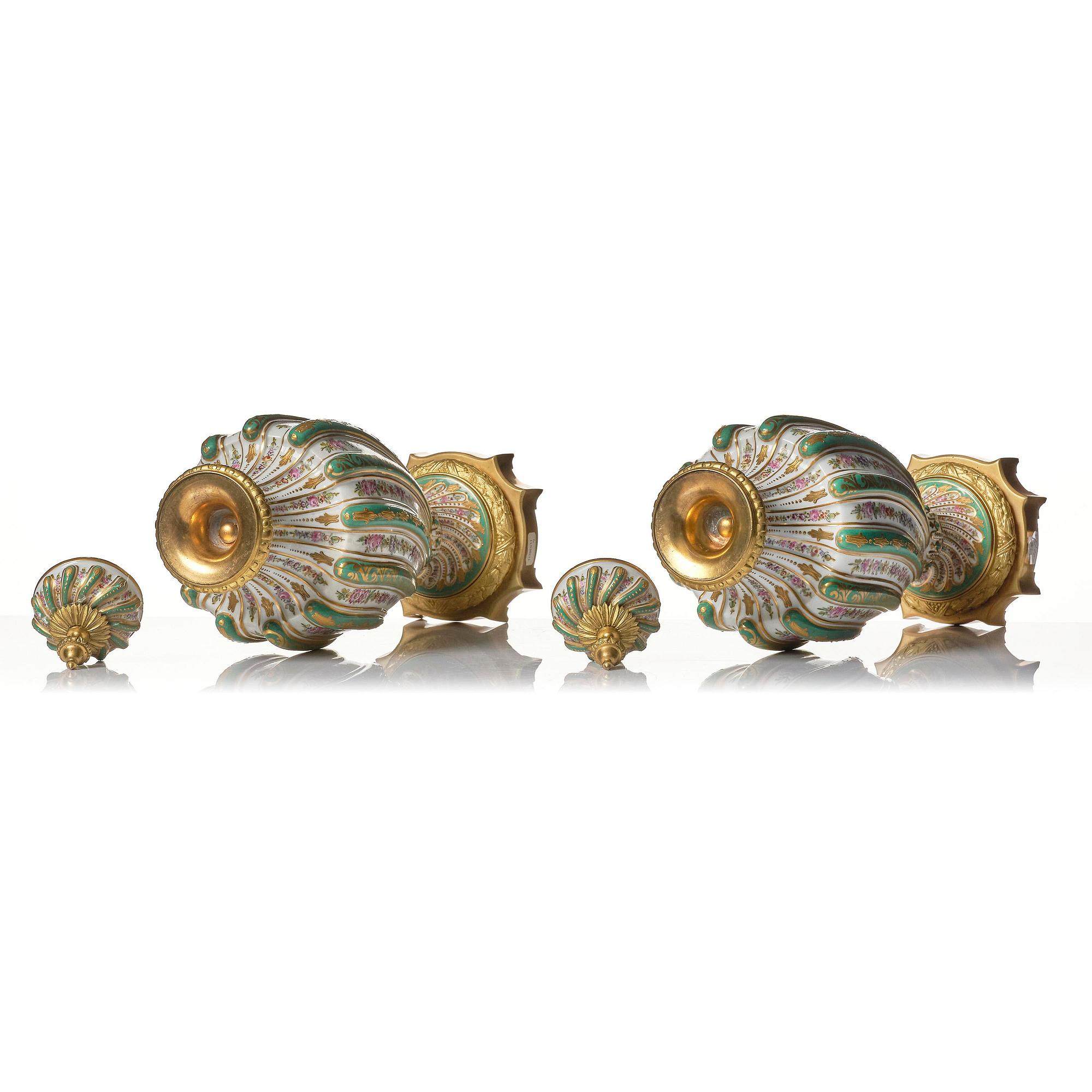 A pair of French 'Sèvres' porcelain urns, 1890s.
