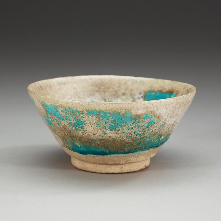 BOWL, pottery. Turquoise glaze. Persia 13th century, probably Kashan.