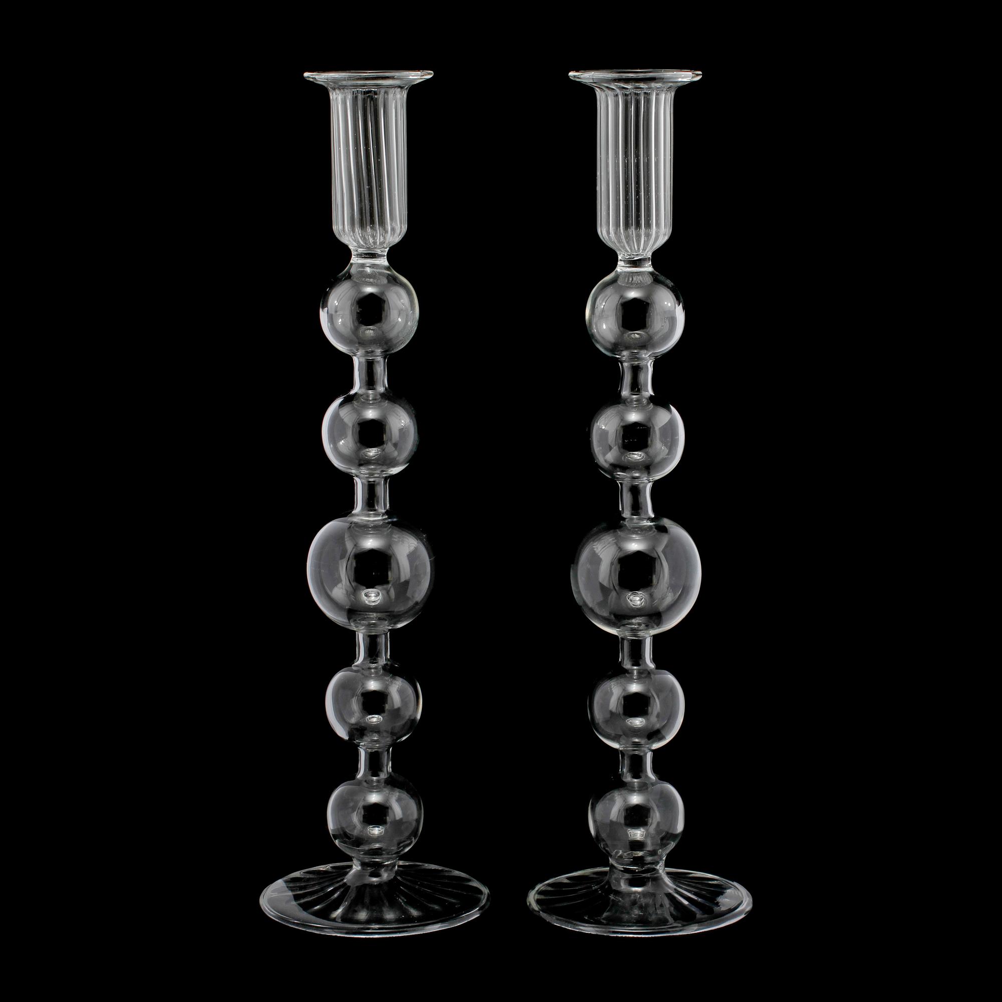 LJUSSTAKAR, ett par, glas, troligen Holland, 1900-talets första hälft.