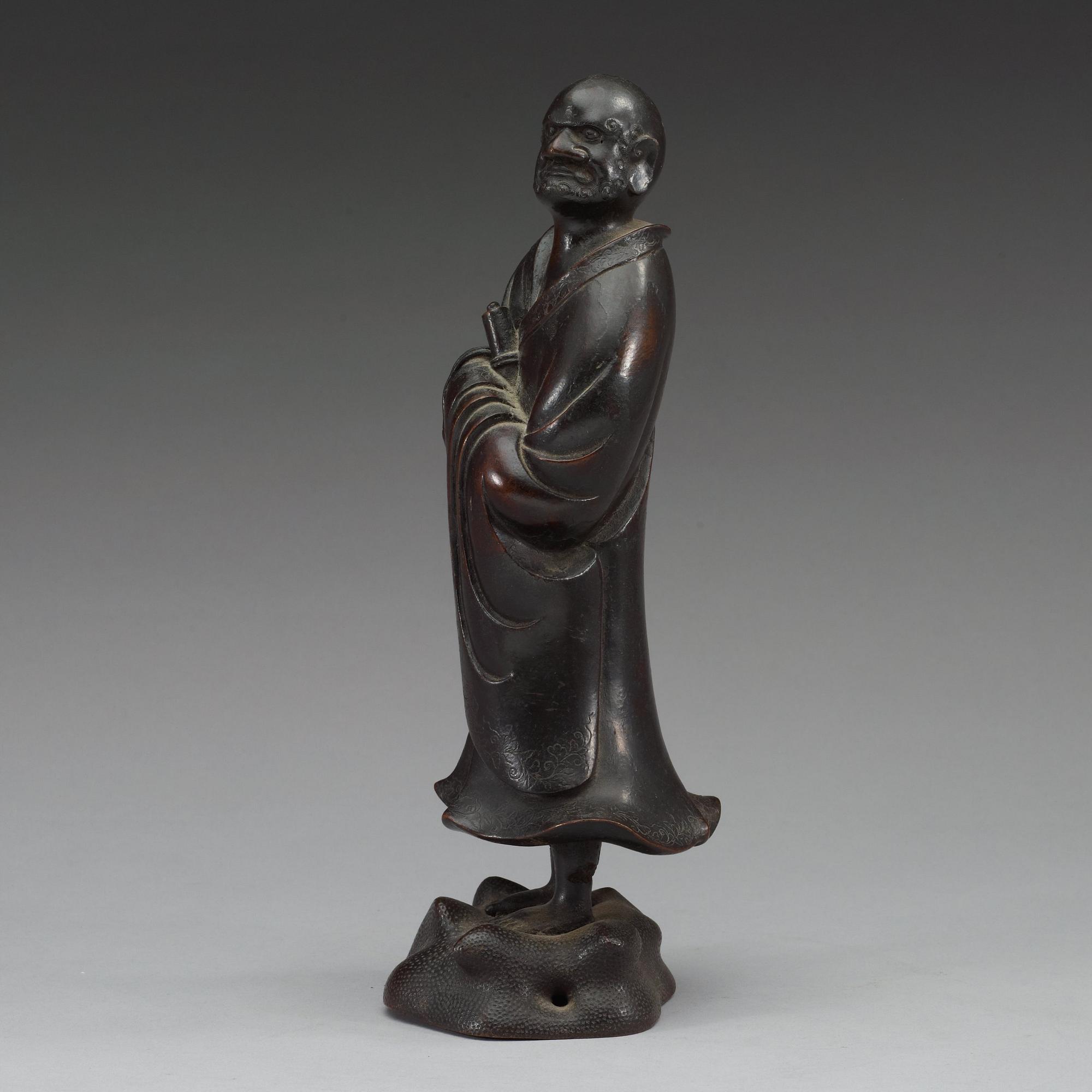 A bronze figure of one of the Lohans, Qing dynasty (1644-1912).
