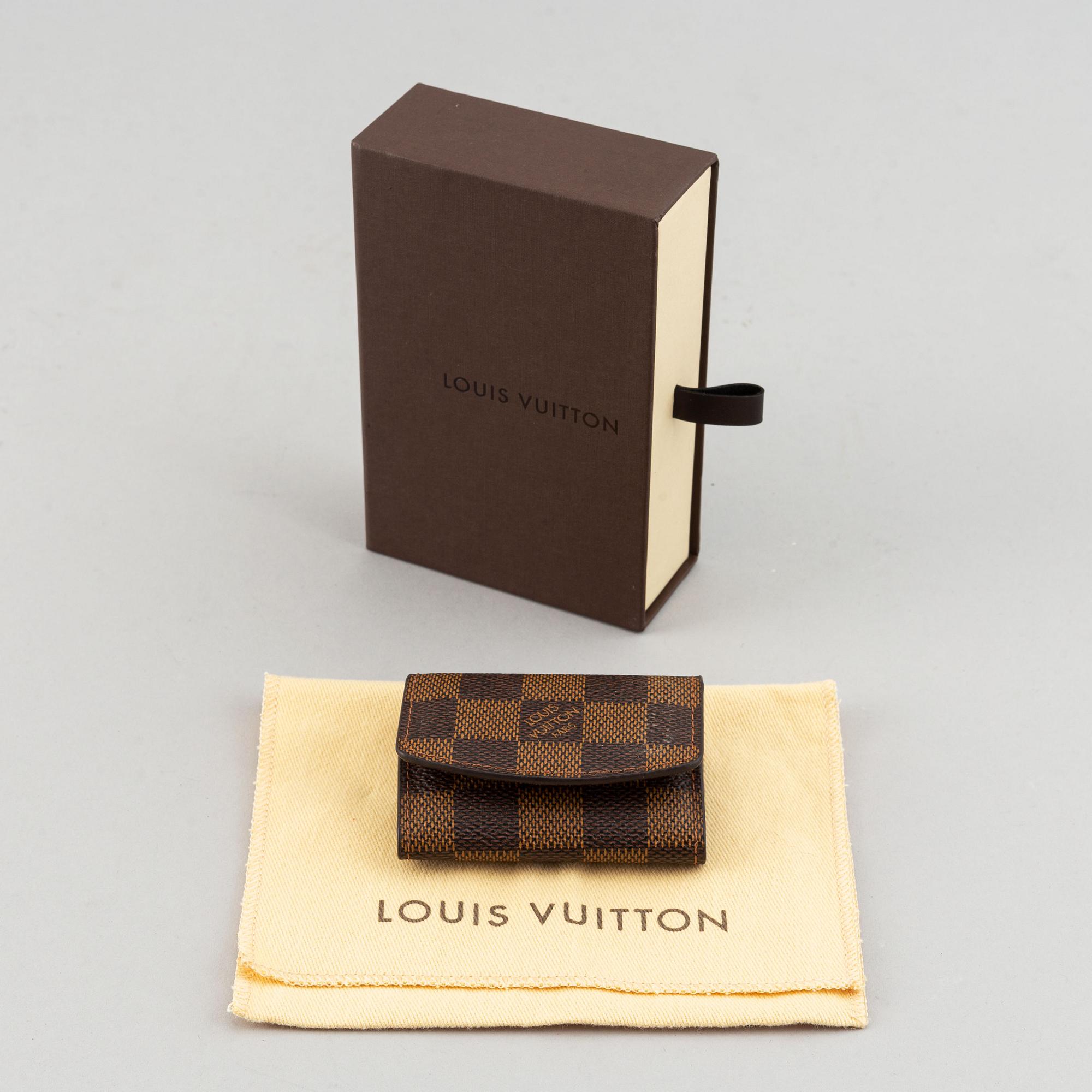 Louis Vuitton and Giorgio Armani, two pairs of cufflinks.