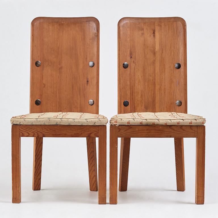 Axel Einar Hjorth, a pair of "Lovö" stained pine chairs, Nordiska Kompaniet, Sweden 1930's.