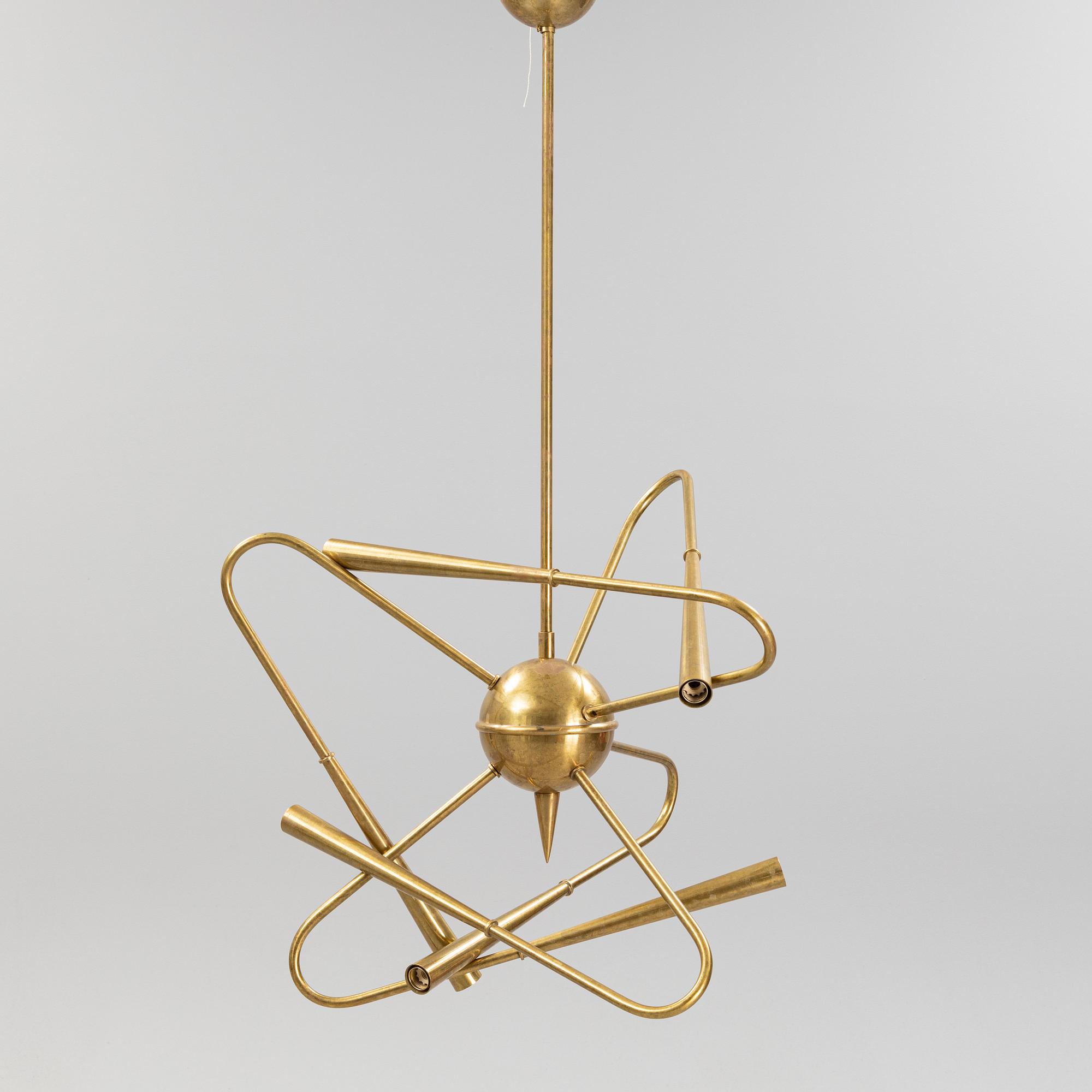 A mid 20th Century brass celiling light.