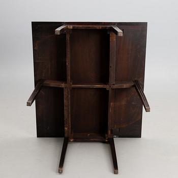 An early 19th century English drop-leaf table.