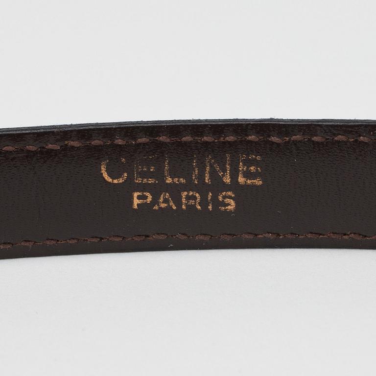 CÉLINE, a brown leather belt.