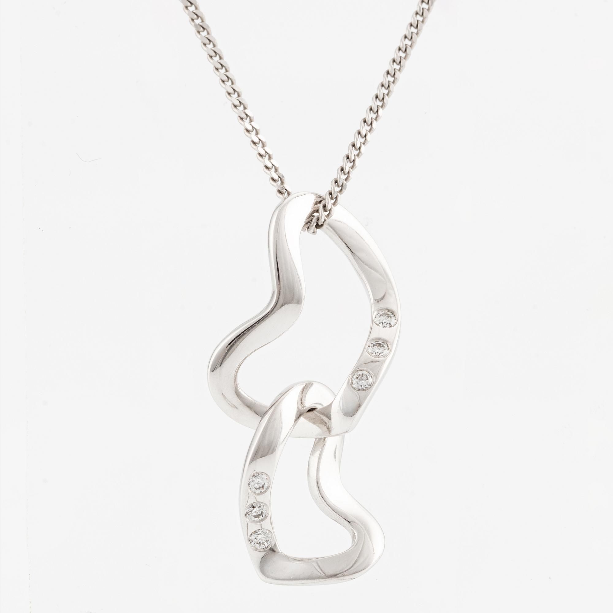 Firma Georg Jensen hänge med kedja 18K vitguld med runda briljantslipade diamanter.