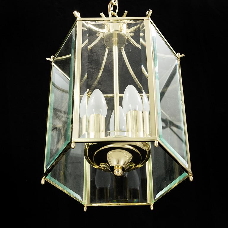 A 20th century brass hexagon hall ceiling lantern for three lights.