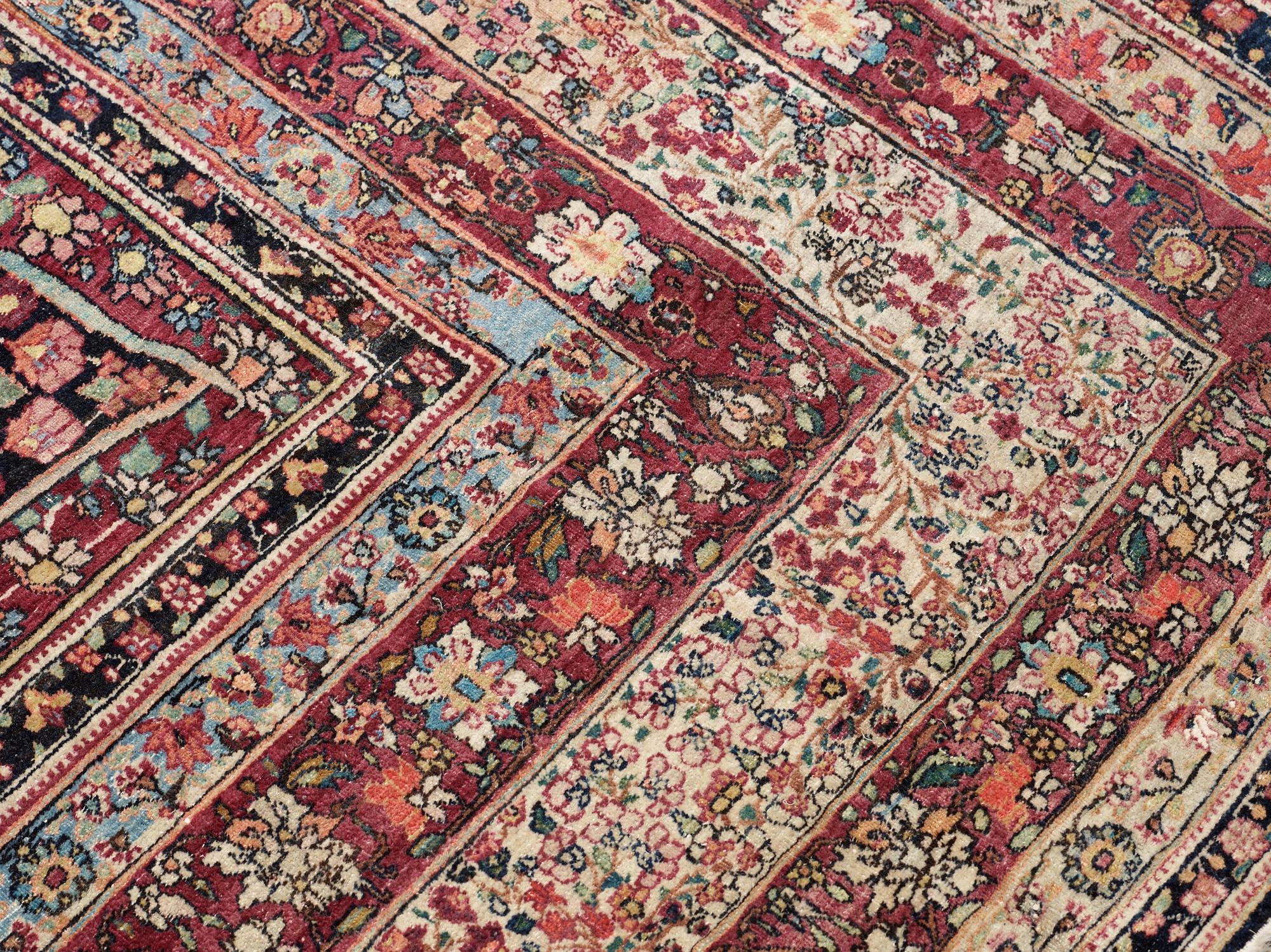 An antique Kerman Laver carpet, c. 586 x 385 cm.