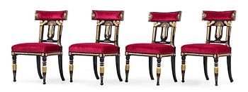 1403. Four late Gustavian early 19th century chairs.
